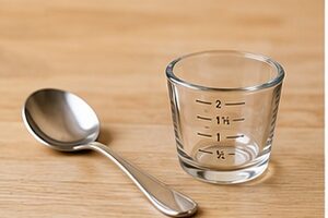 Combien de cuillères à soupe y a-t-il dans une once ?